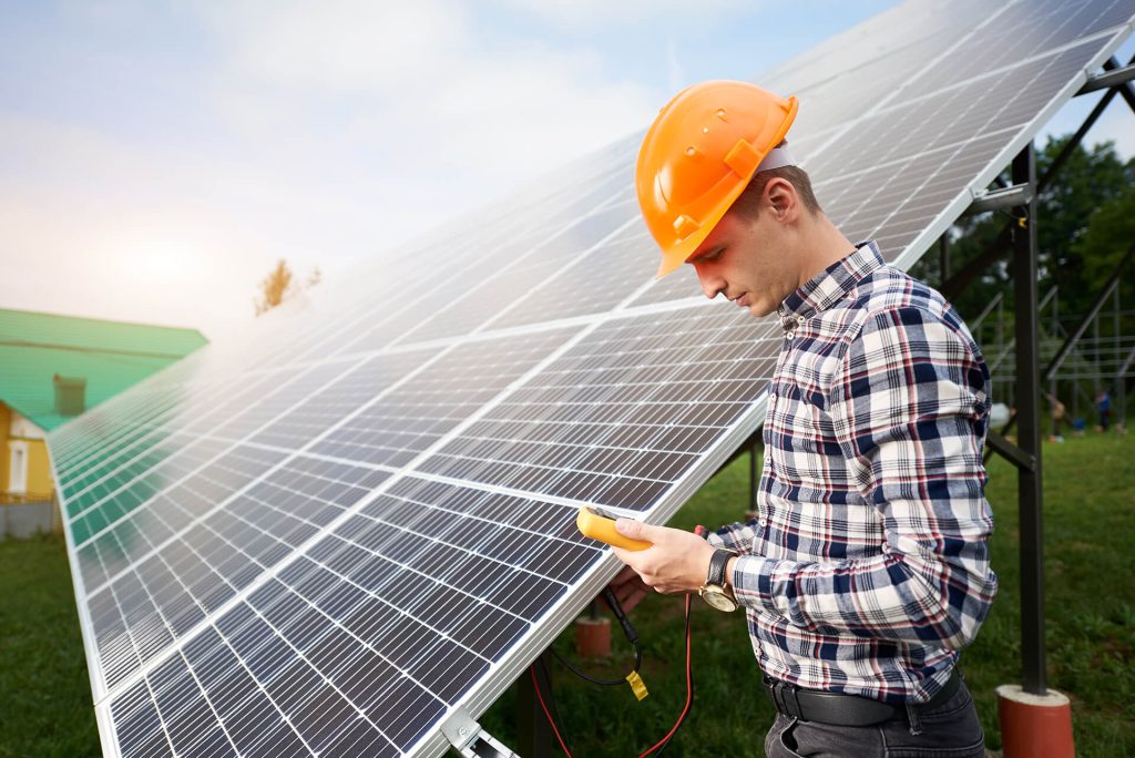 male with sensor in his hands near solar panels wh 2025 01 16 22 07 11 utc