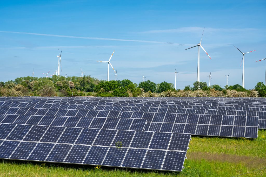 solar panels with wind wheels in the back 2025 03 09 07 17 28 utc