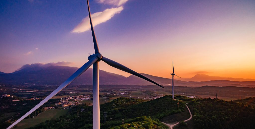 wind turbines windmill energy farm at sunset in it 2025 03 18 15 32 00 utc