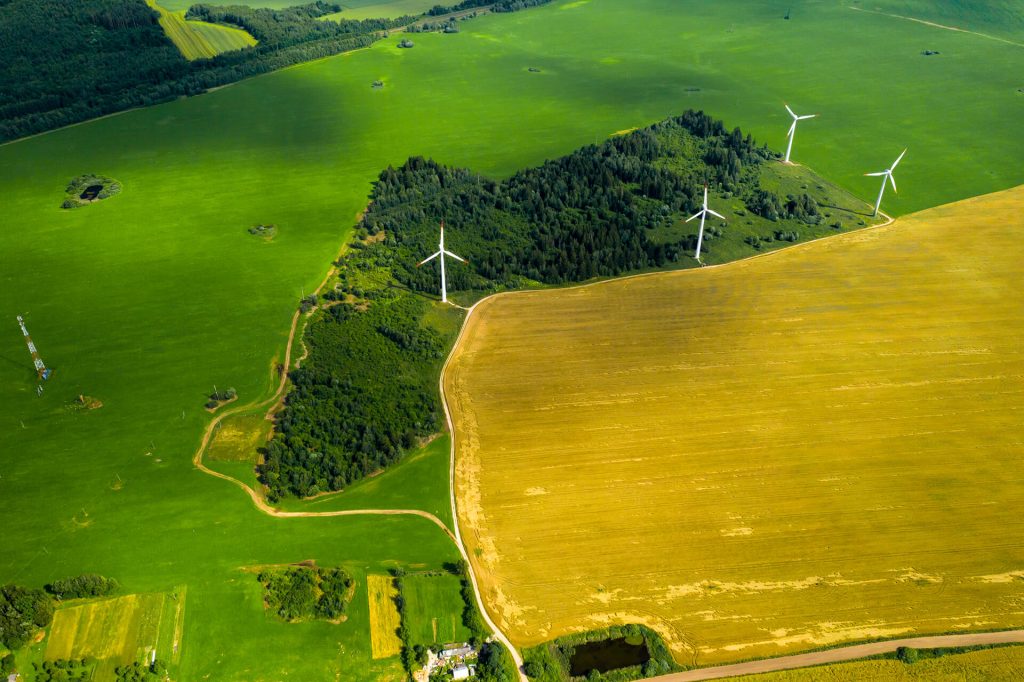 windmills on the background of forests and fields 2025 03 24 08 42 37 utc